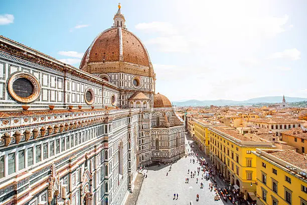 Top cityscape view on the dome of Santa Maria del Fiore church and old town in Florence