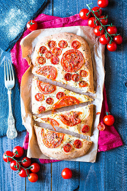 istock Tasty Hand Made Tomatoes and Pepperoni Pizza 598141570