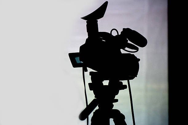 istock Silhouette of the TV camera 598146222