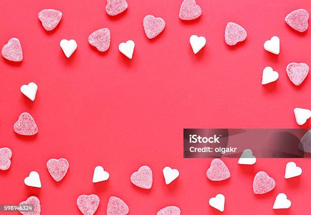 Festive Red Background And Sweet Sugar Hearts Valentines Day Stock Photo - Download Image Now
