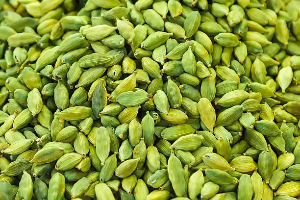 Pods of green cardamom in a pile
