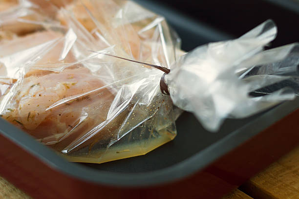 istock Chicken breasts in a plastic cooking bag 598149598
