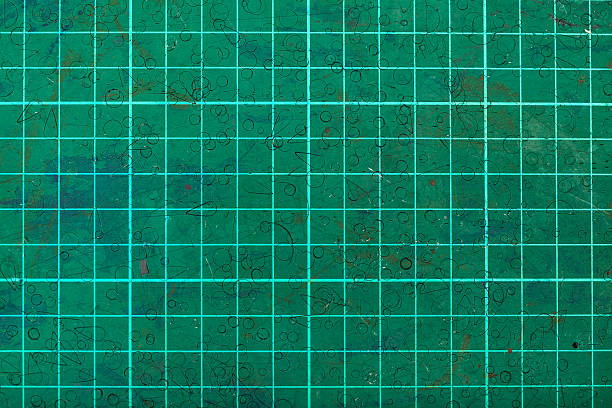 istock green self-healing cutting mat close up 598152772