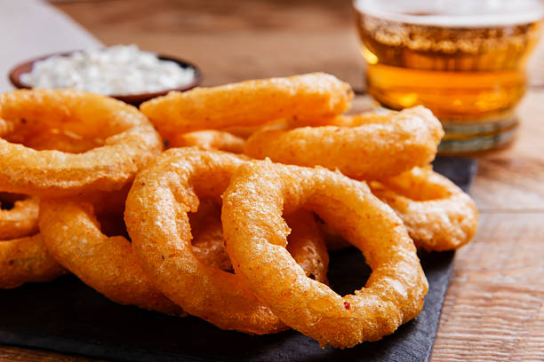 istock fried onion rings in batter with sauce 598154286