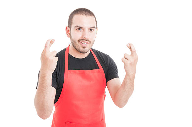 istock Smiling handsome employee doing double luck sign 598154642