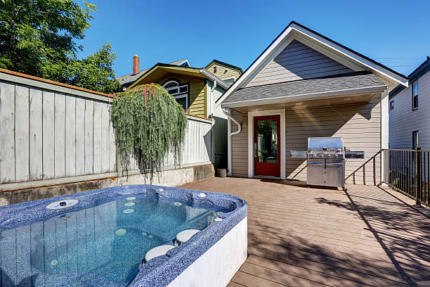 istock Wooden walkout deck with hot tub and barbecue 598158186