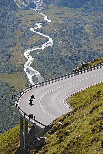 Motorcycle in one of the hairpins bends of the the Furka pass