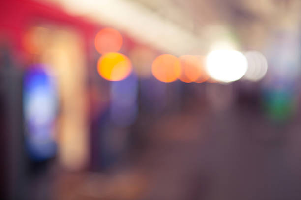 istock Abstract blurred background many of people walking and standing 598160110