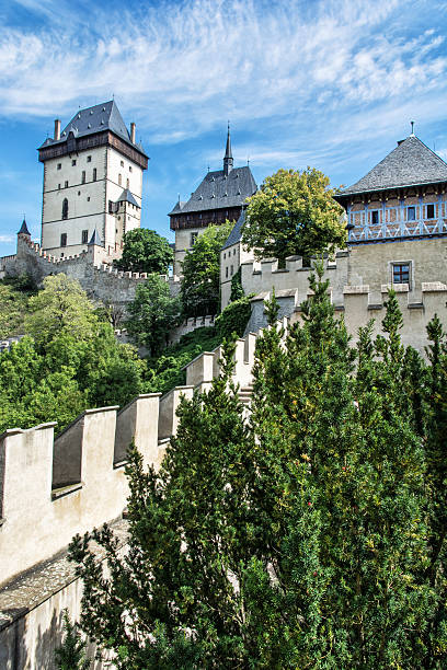 Karlstejn is a large gothic castle founded 1348 by Charles IV in Czech republic. Ancient architecture. Travel destination. Vertical composition.
