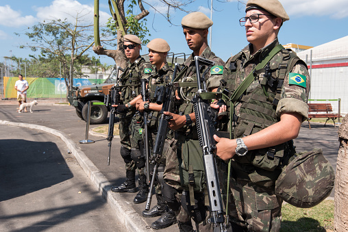 Rio de Janeiro, Brazil - August 4, 2016: Brazilian army soldiers guarding the Athlete Village as part of the security plan during the Olympic Games.