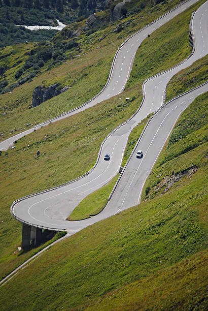 Traffic on the Furka pass Traffic on the the Furka pass between Realp and Gletsch grimsel pass photos stock pictures, royalty-free photos & images