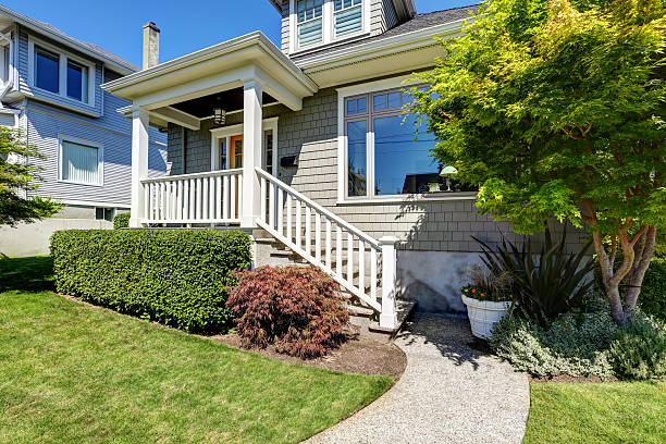istock Craftsman house porch with square columns and staircase 598163506