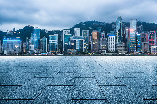 istock empty pavement front of  hong kong victoria harbour 598163834