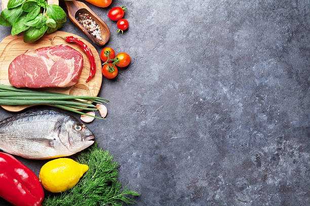 istock Vegetables, fish, meat and ingredients cooking 598164302