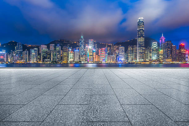 istock empty pavement front of  hong kong victoria harbour 598164932