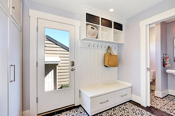 istock White hallway interior.  Storage cabinet with hangers 598165188