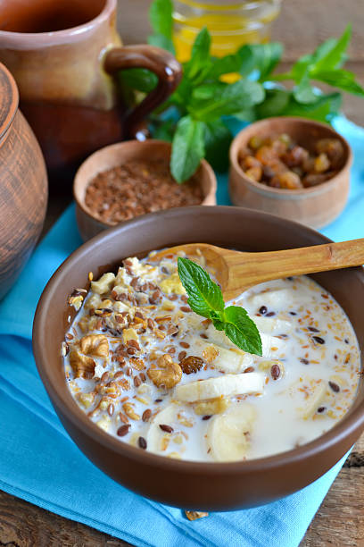 istock Granola with milk, walnuts and a banana for breakfast 598165916