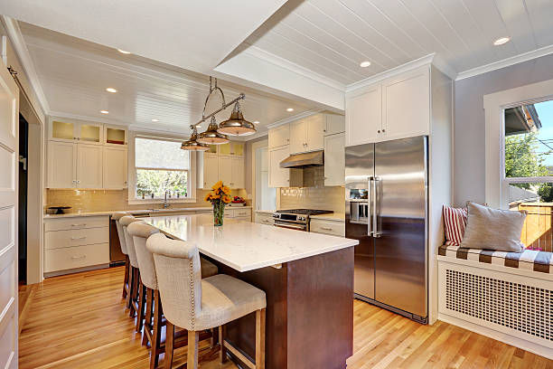 istock White interior of kitchen room with large kitchen island. 598166040