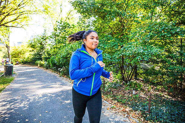 istock Woman running in Central Park New York 598166704