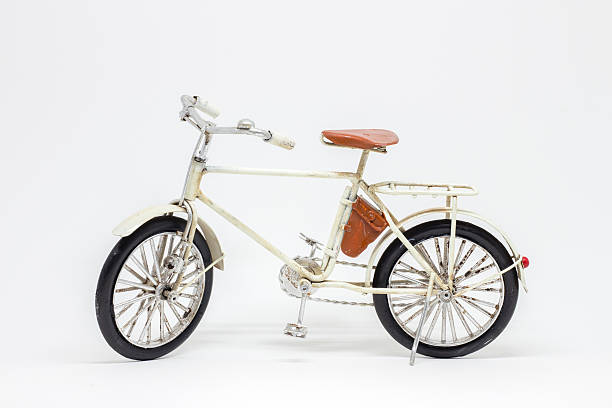 istock Hand made white bicycle model isolated on white background 598167808