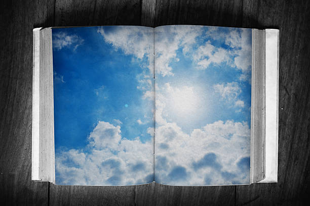 istock Grunge paper book and summer sky 598169776