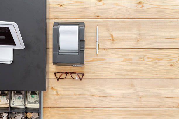 Business cash register on a clean desk stock photo