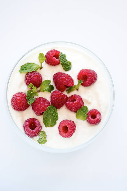 istock Red Raspberries in bowl of Yoghurt 598172024