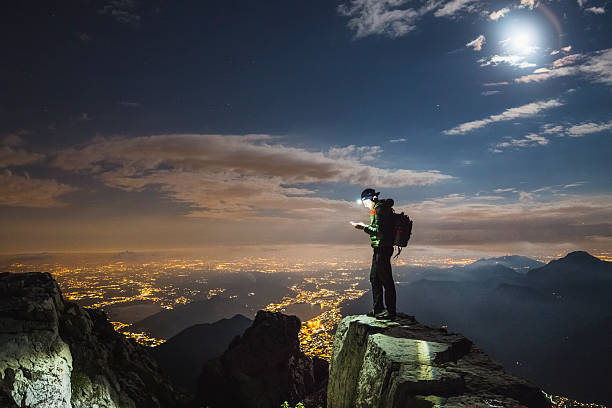 istock Hiker checks your device on top on the mount 598176426