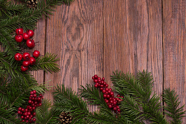 istock Christmas fir tree on wooden background 598177180