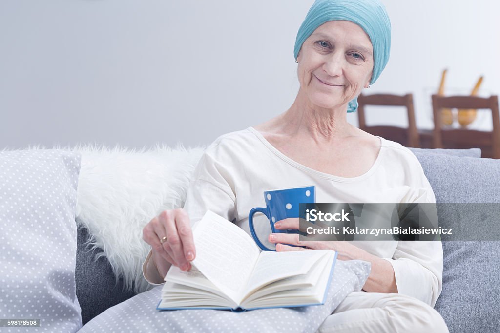 Compulsory sick leave Shot of a sick woman resting in her room Adult Stock Photo