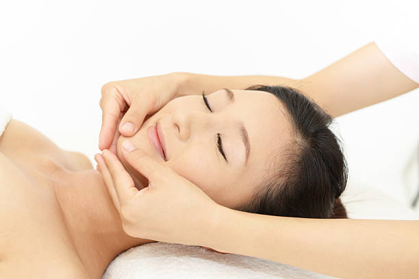 istock Woman getting a facial massage 598214488