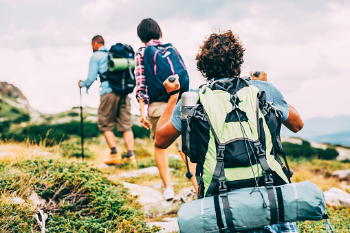 Hikers climbing up the mountain.