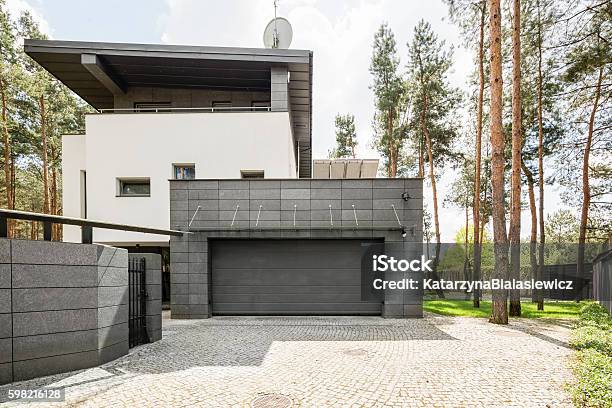 Special Place For The Car Stock Photo - Download Image Now - Garage, Gate, Modern