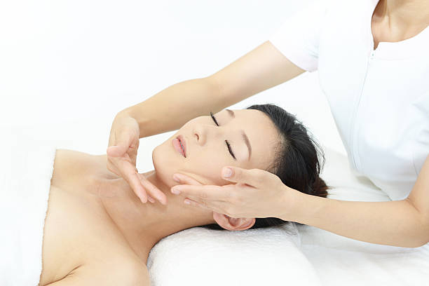 istock Young woman getting a massage in a spa 598216344