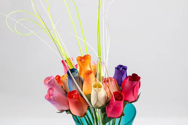 istock artificial flower and vase with on white background. 598216836