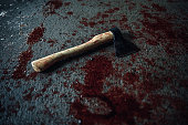 Bloody ax lying on the floor