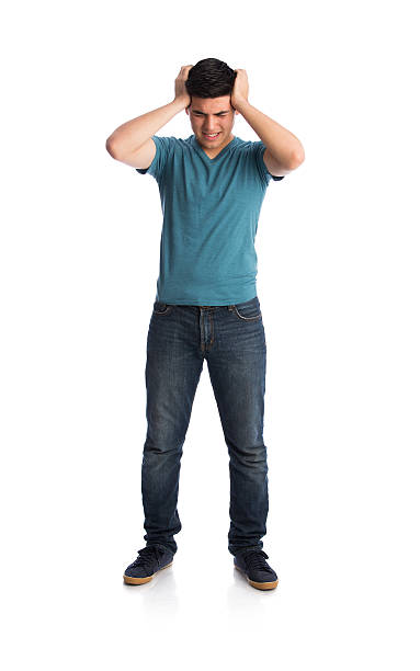 istock Young latin man standing and gesturing headache 598217860