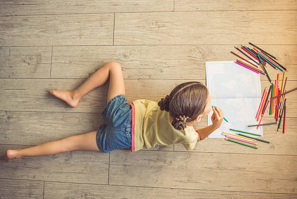 istock Charming little girl at home 598218848
