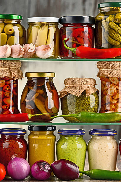 istock Jars with variety of pickled vegetables. 598220188