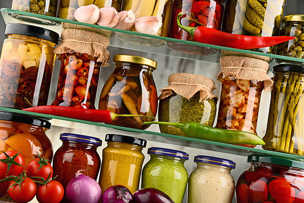 istock Jars with variety of pickled vegetables. 598220240