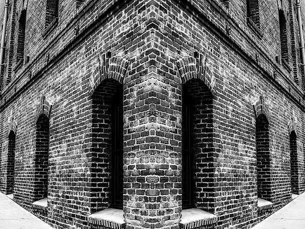 istock old brick building with windows in black and white 598221132