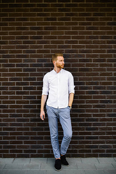 istock Handsome male listening music 598221474