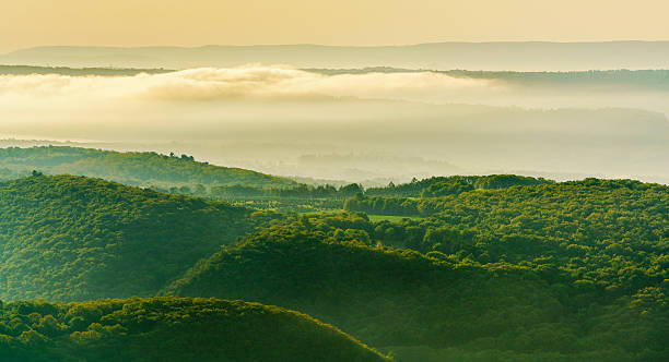 Epic overview outlook mountain view to the Lehigh Water Gap area from Flagstaff Point, nearby to Jim Thorpe (Mauch Chunk), Poconos region, Pennsylvania, USA. Early morning at mid summer, with the low clouds and haze.