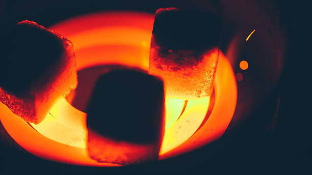 istock coconut charcoal for hookah on red-hot spiral 598223126