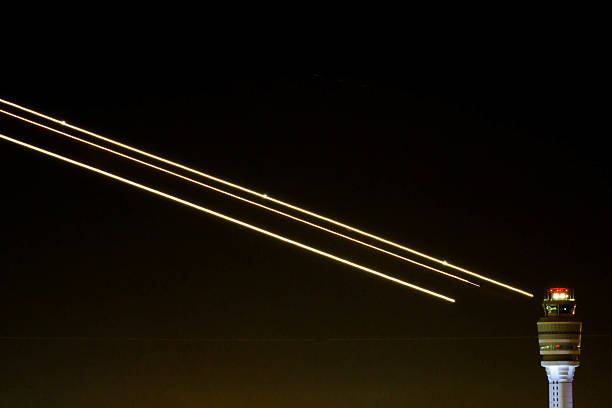 istock take off and control tower at airport 598223354