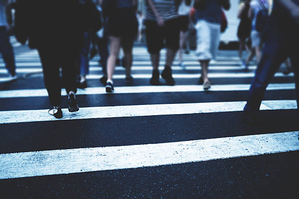 istock nyc commuters crossing the street 598223532