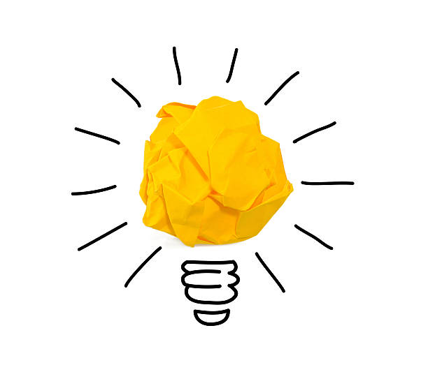 istock Inspiration crumpled yellow paper light bulb idea 598223726