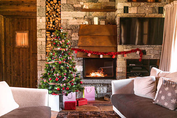 istock living room with christmas tree and the fireplace 598223900
