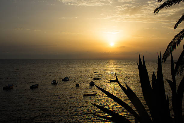 istock the sun approaches to water blushing with emotion 598225148