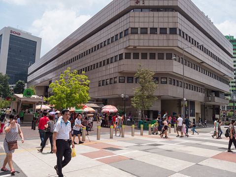 Singapore, Singapore - April 10, 2016: People are walking on the pedestrian street between Fu Lu Soh Complex, Albert Centre  Market & Food Centre and Bugis Street Market.